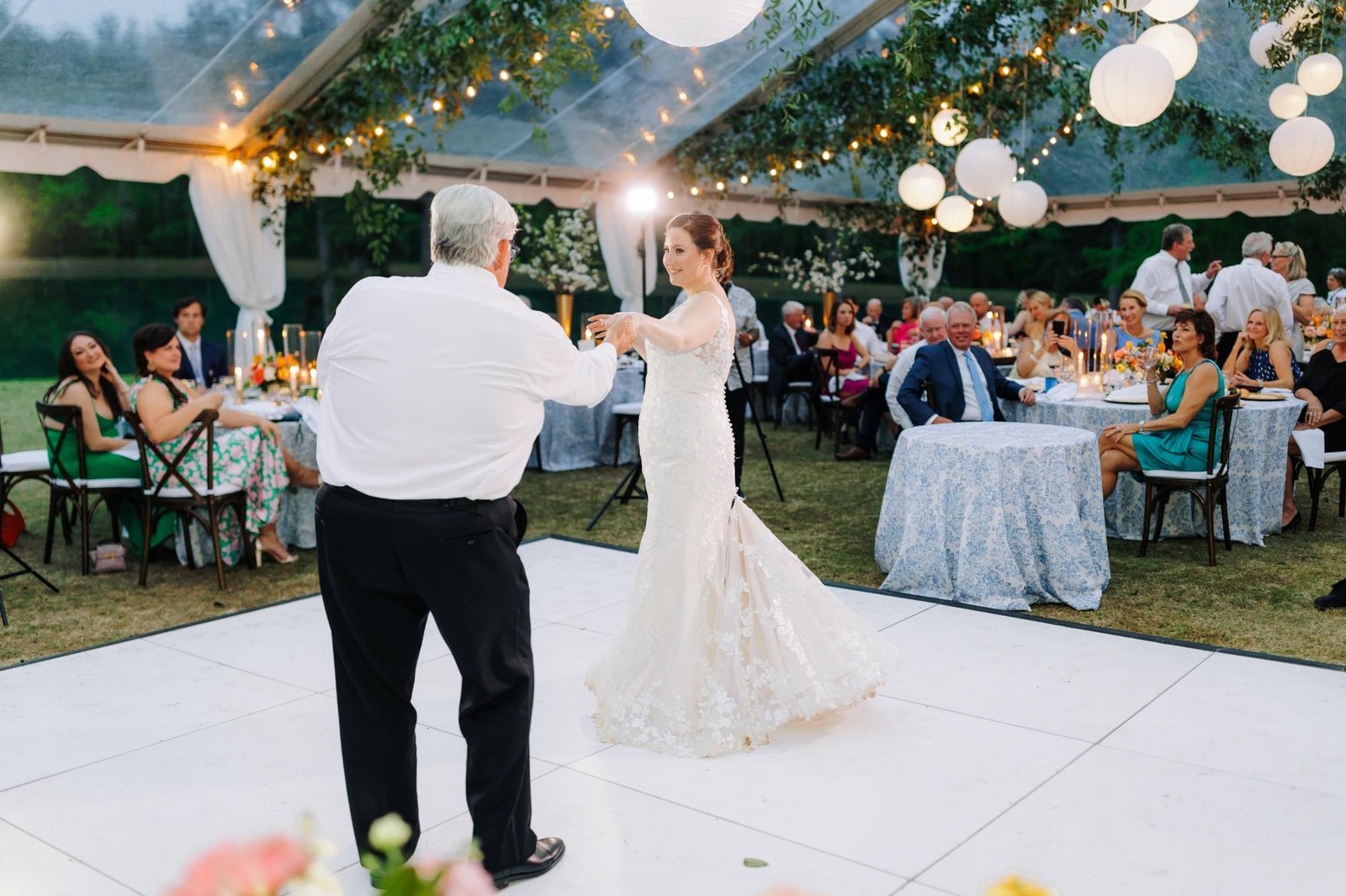 Solid black and white dance floor set up at a San Francisco wedding reception