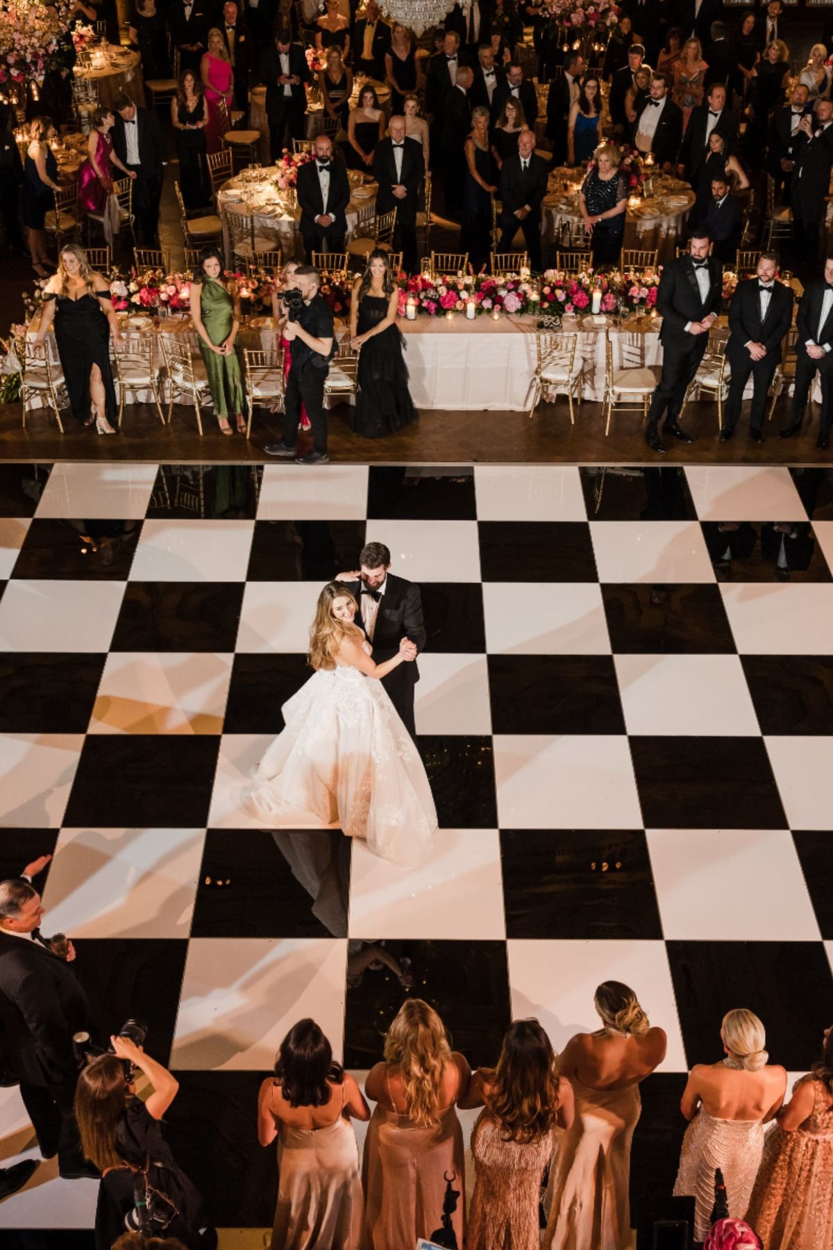 Custom printed vinyl wrap dance floor with couple's monogram at a San Francisco wedding